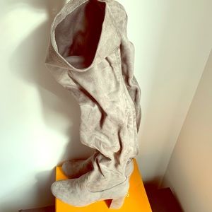 Knee high boots with heels.